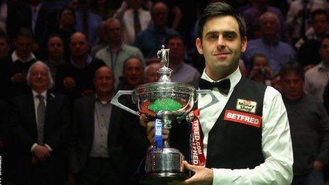 Ronnie O'Sullivan poses with the World championship