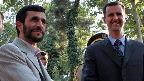 Iranian President Ahmadinejad and Syrian President Assad at a welcoming ceremony in Tehran in August 2005.