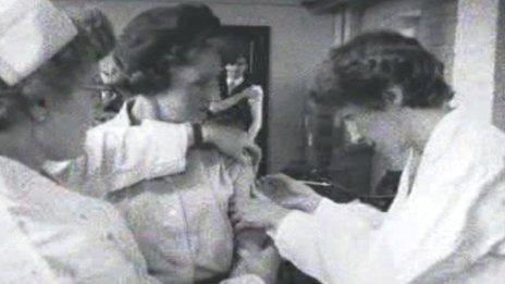 Woman having vaccination