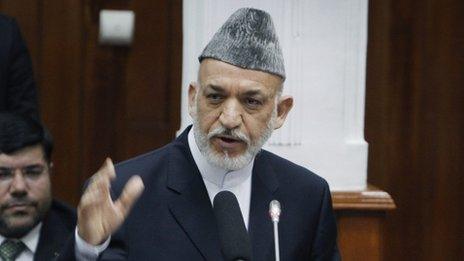 President Hamid Karzai speaks to lawmakers in parliament on Thursday