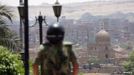 An Egyptian soldier looks out over Cairo during presidential election - 24 May 2012