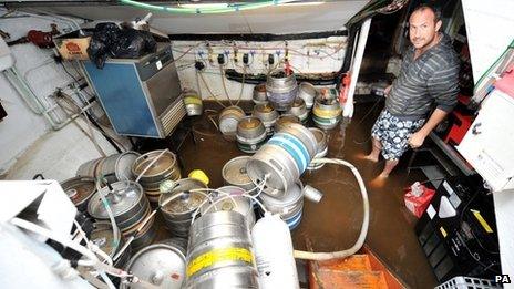 Jon Lilley in the flooded cellar of his pub