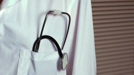A stethoscope in a doctor's coat pocket