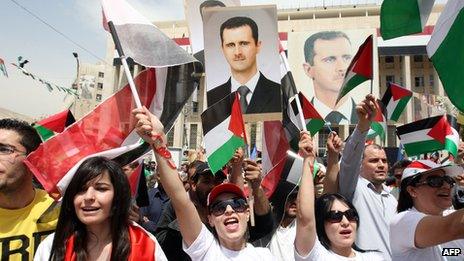 Supporters of President Bashar al-Assad attend a demonstration on the anniversary of the founding of the Baath Party in Damascus (7 April 2012)