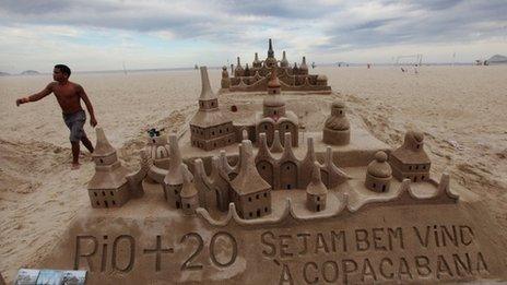 A Rio+20 sand sculpture is seen on Copacabana beach on the final day of the UN conference on 22 June 2012 in Rio de Janeiro