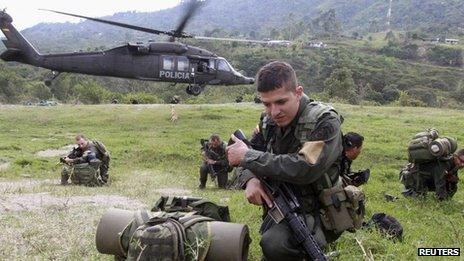 Colombian police officers land in Toribio, in the province of Cauca 12 July 2012.