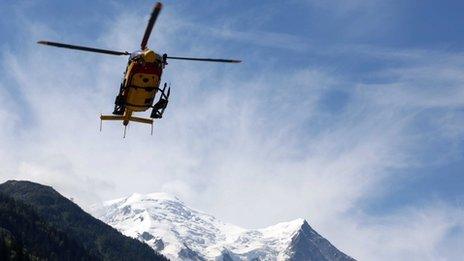 rescue helicopter returning from the avalanche site lands in Chamonix