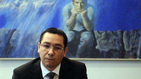 Victor Ponta looks at the Romanian Mission of the European Union, in Brussels, on July 12