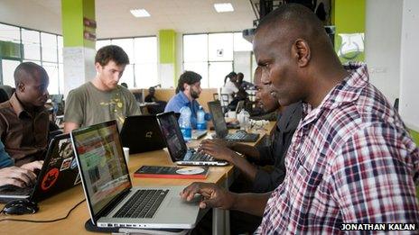 A man uses a laptop at iHub in Kenya