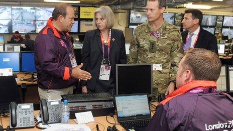 Home Secretary Theresa May and Lord Coe in the Olympics security control room, Stratford, east London