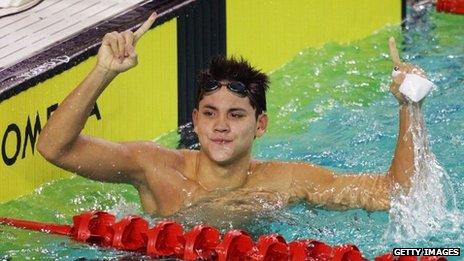 Joseph Schooling of Singapore celebrates winning the Mens 50m Butterfly Final on day two of the 2011 Southeast Asian Games at Jakabaring Sports Complex on 12 November, 2011 in Palembang, Sumatra, Indonesia.