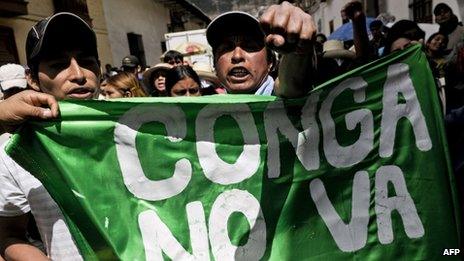 People slogans during a protest against US Conga mining project in Cajamarca on 9 July 2012