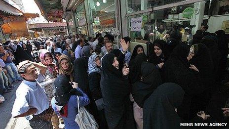 People queuing up for subsidised chicken in Tehran