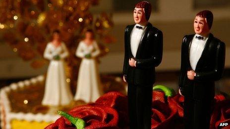 Same-sex figurines on a wedding cake on California