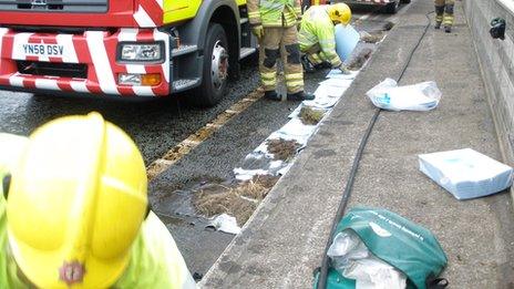 Firefighters blocking drains
