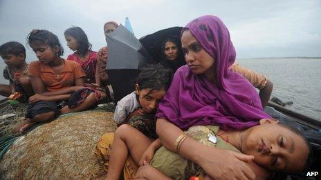Rohingya Muslims, trying to cross the Naf river into Bangladesh to escape sectarian violence in Burma (12 July)