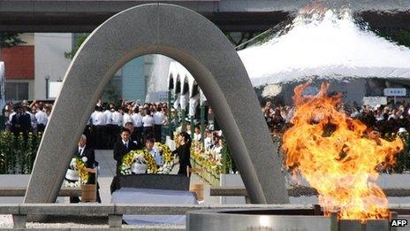 Relatives of victims lay wreaths at an altar for the atomic bomb victims in Hiroshima on 6 August 2012