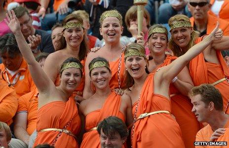 Supporters of the Netherlands in orange outfits