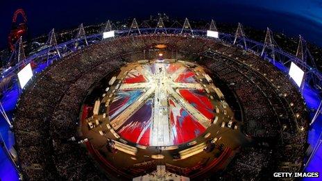 A general view of the stadium as a union jack is formed during the closing ceremony of the London 2012 Olympic Games