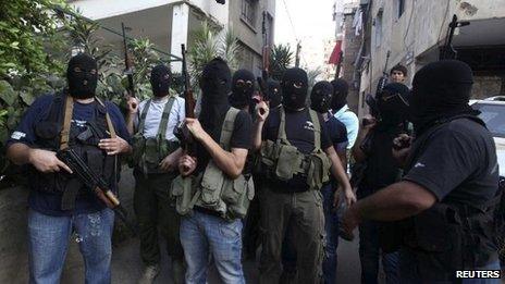 Masked gunmen from the al-Meqdad clan in the southern suburbs of Beirut (15 Aug 2012)