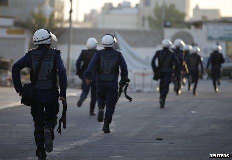Bahraini riot police deploy in Sitra, south of Manama, 17 August