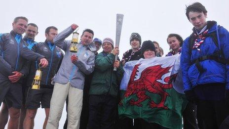 Paralympic flame at the top of Snowdon