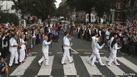 Torchbearers at Abbey Road crossing
