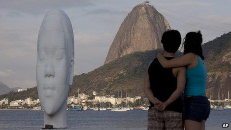View of a sculpture by Spanish artist Jaume Plensa on Botafogo beach