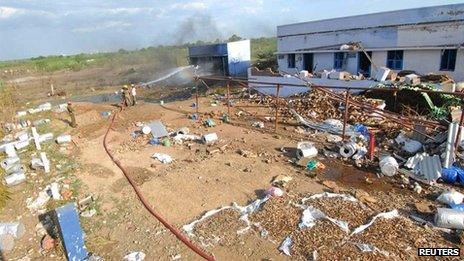Firefighters work at the scene of a fire at a fireworks factory at Sivakasi town, about 540 km (335 miles) southwest of the southern Indian city of Chennai September 5, 2012