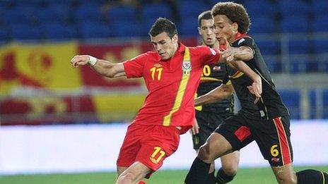 Wales' Gareth Bale takes on the Belgium defence
