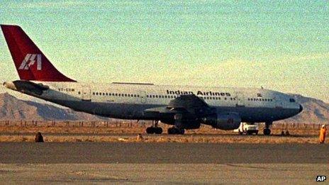 A hijacked Indian Airlines jetliner on the tarmac of Kandahar airport in Afghanistan on December 26, 1999