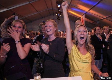 Supporters of the centre-right VVD party cheer in The Hague on election night, 12 September