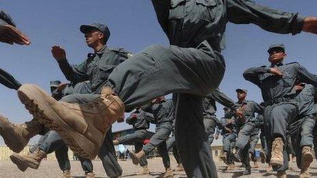 Afghan National Police (ANP) personnel march during a graduation ceremony in Herat