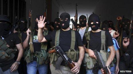Masked gunmen from the Mekdad clan