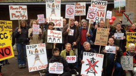 A wind farm protest outside Powys council's headquarters