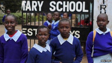 Children stand outside their primary school in Nairobi - 5 September 2012