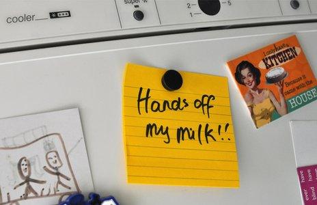 Note on fridge reading 'Hands off my milk!'