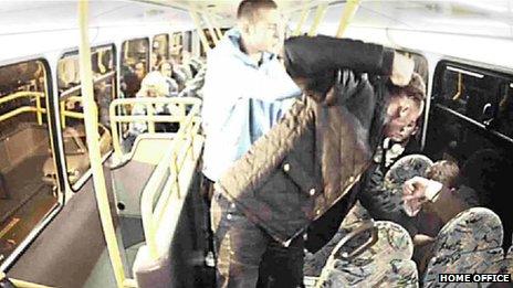 Yob punches man on a bus