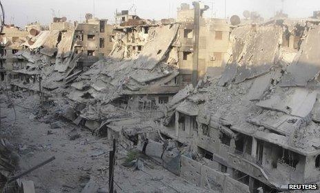 Picture published by opposition activists purportedly showing destroyed buildings in the Khalidiya district of Homs (8 October 2012)