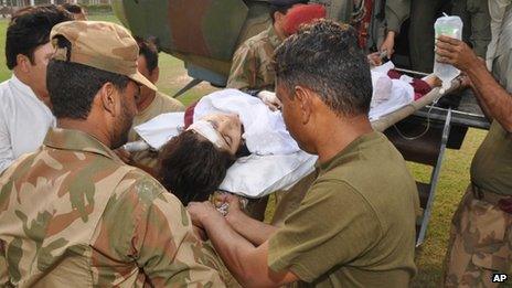 Malala Yousufzai being transported to a military hospital in Peshawar