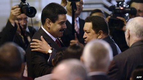 Nicolas Maduro (left) and Hugo Chavez