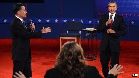 Mitt Romney (left) and Barack Obama on stage at the second presidential debate, Hempstead, New York 16 October 2012