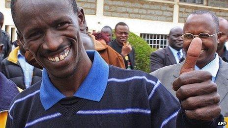 Ezekiel Kemboi gives the thumbs up outside Eldoret court in Kenya on 25 September 2012