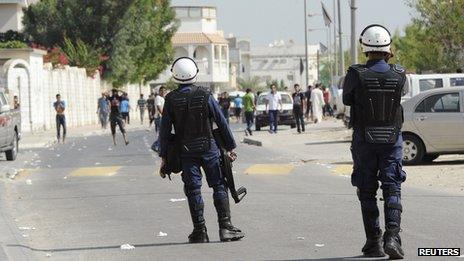 Bahraini police confront anti-government protesters in Diraz, west of Manama, on 9/11/12