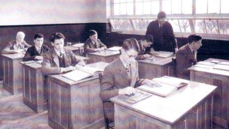 Pupils working in a classroom at Worcester College in the 1930s