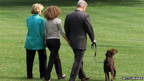 The Clinton family - with dog, Buddy - leave the White House for a holiday, a day after Bill Clinton admitted an "improper relationship" with former White House intern Monica Lewinsky