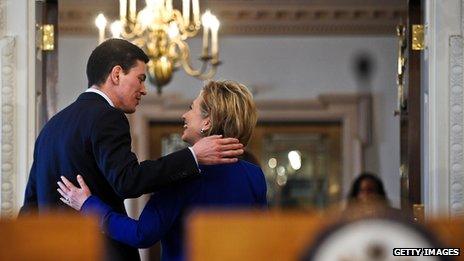 Clinton with former UK Foreign Secretary David Miliband, after a press conference in Washington