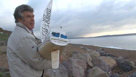 Snoopy Sloop launched from Barton-on-Sea beach