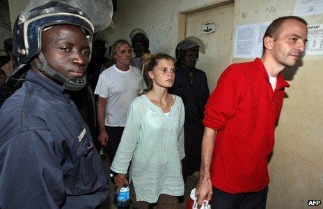 Eric Breteau (in red top) followed by Emilie Lelouch and Alain Peligat during their trial in Chad, December 2007