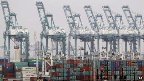Shipping containers are seen as port operations are halted during a strike at the Port of Los Angeles Tuesday, 4 December 2012